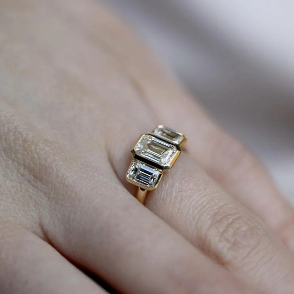 Emerald Three Stone Moissanite Ring