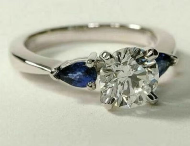 Round Moissanite Diamond And Sapphire Blue Pear Diamond Ring